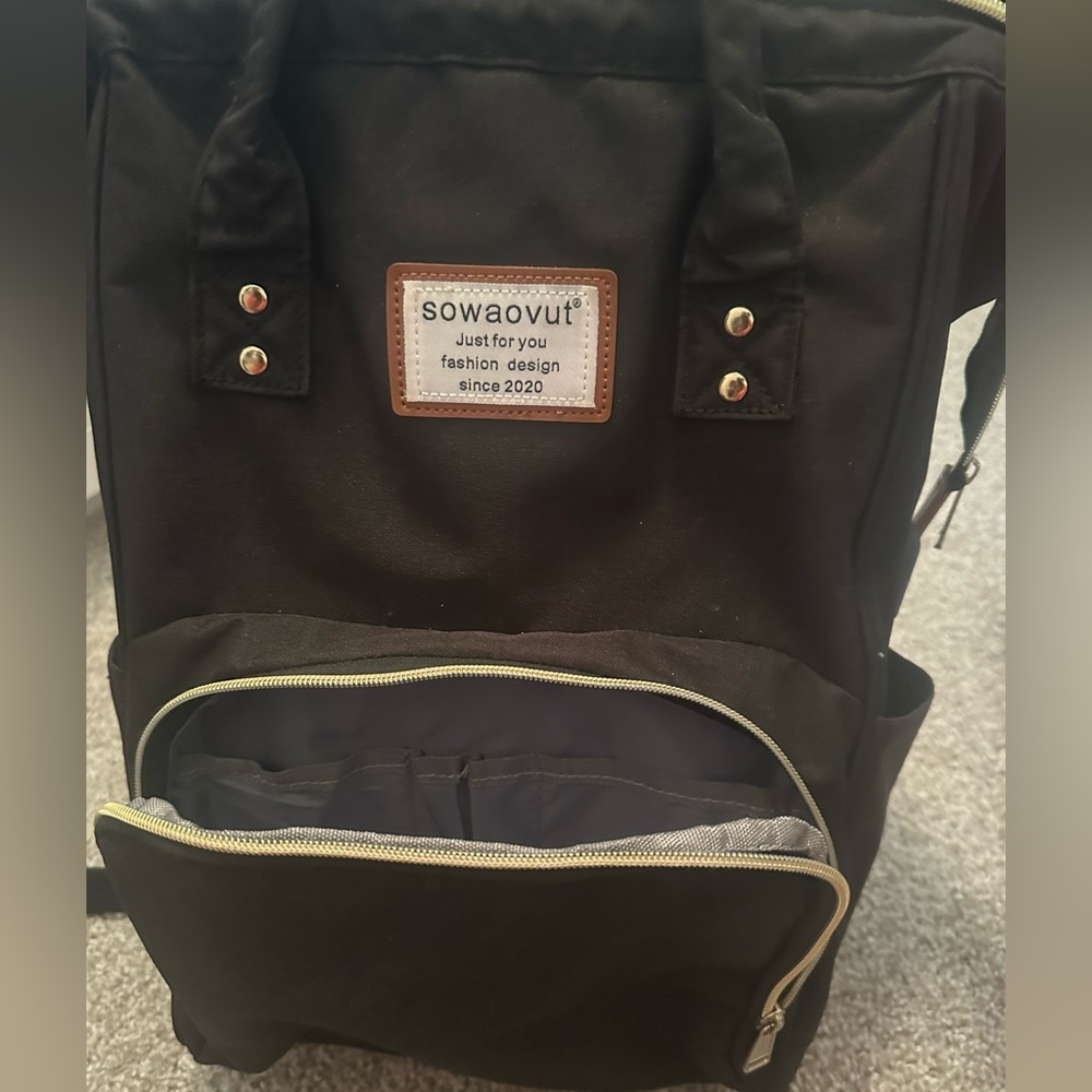Black backpack functional pockets